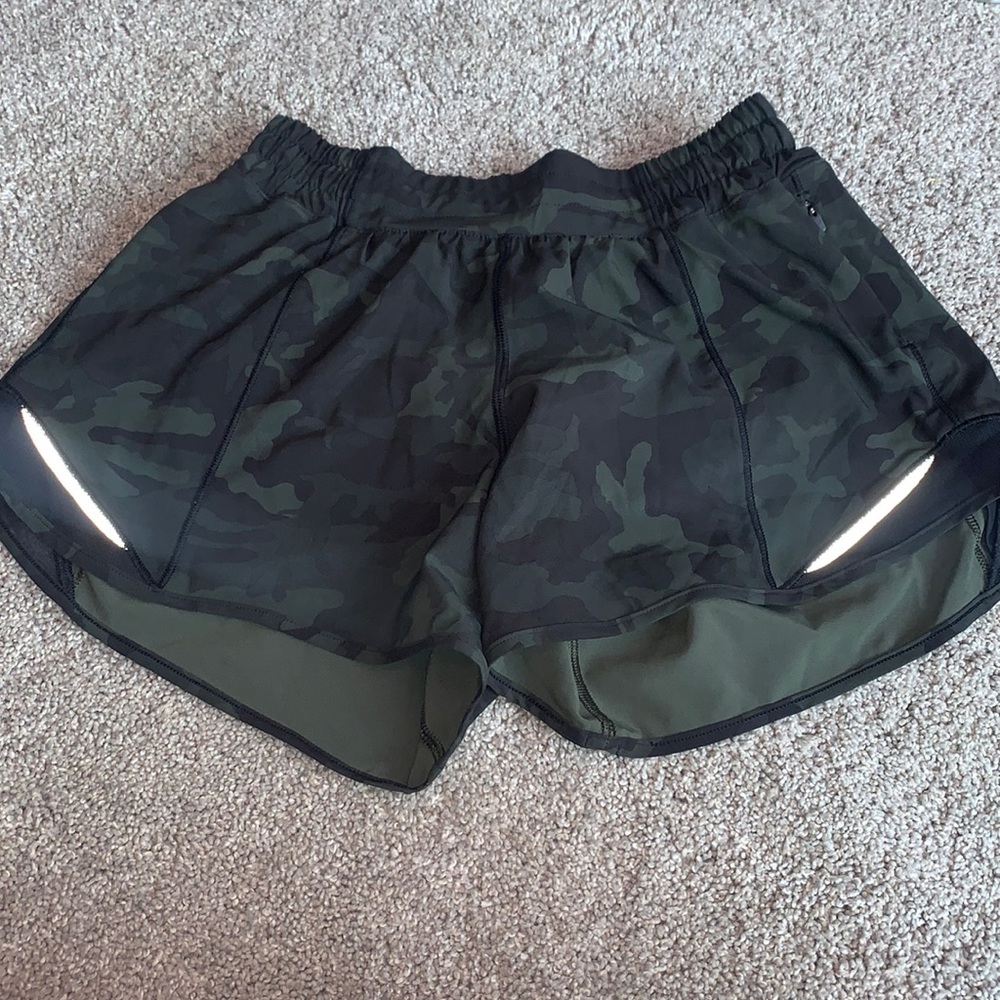 Green and black camo athletic shorts